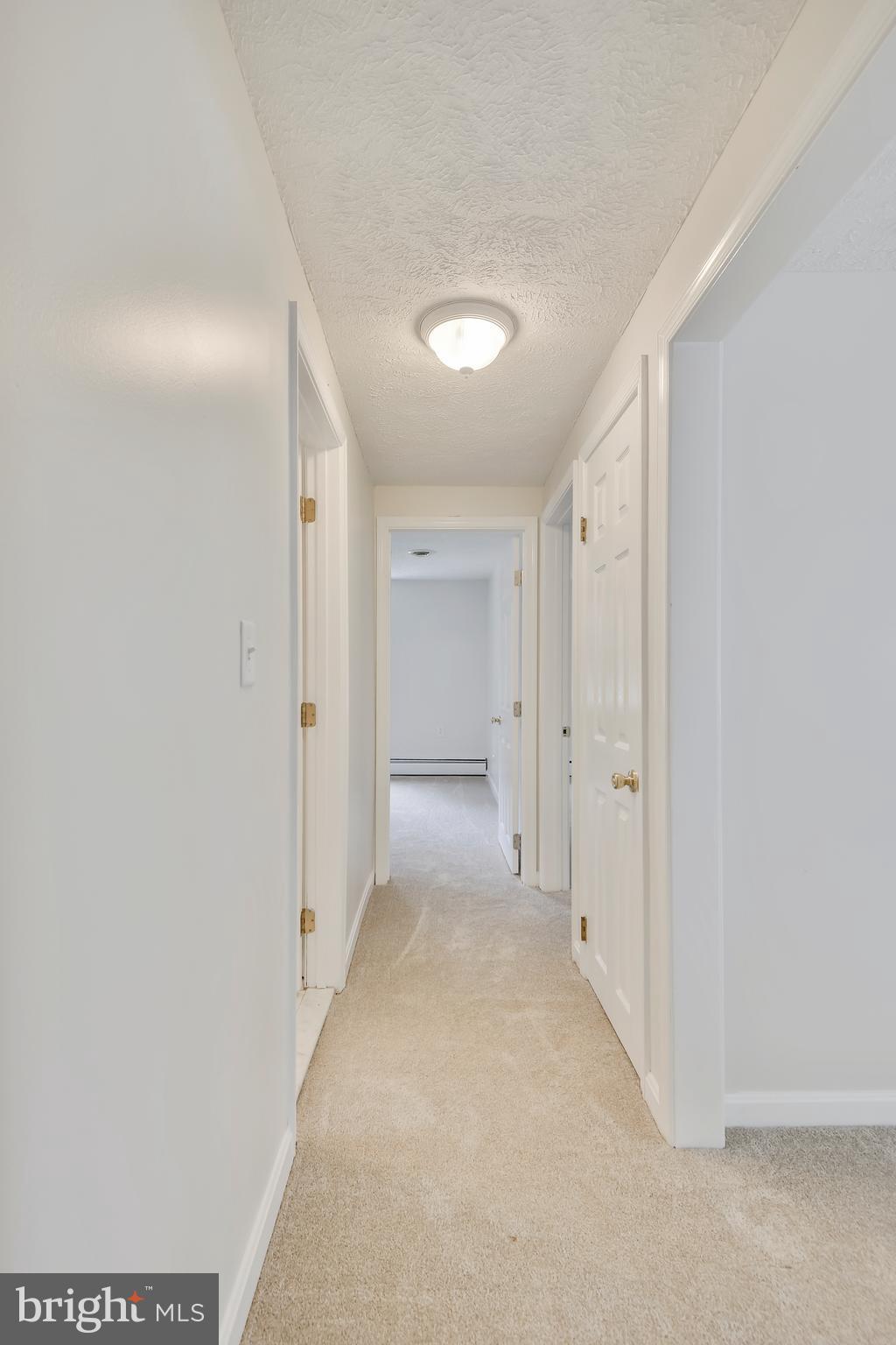 102 Little Jean Road Stevensville, MD 21666 - Photo 17 of 30 Hallway between Bedrooms