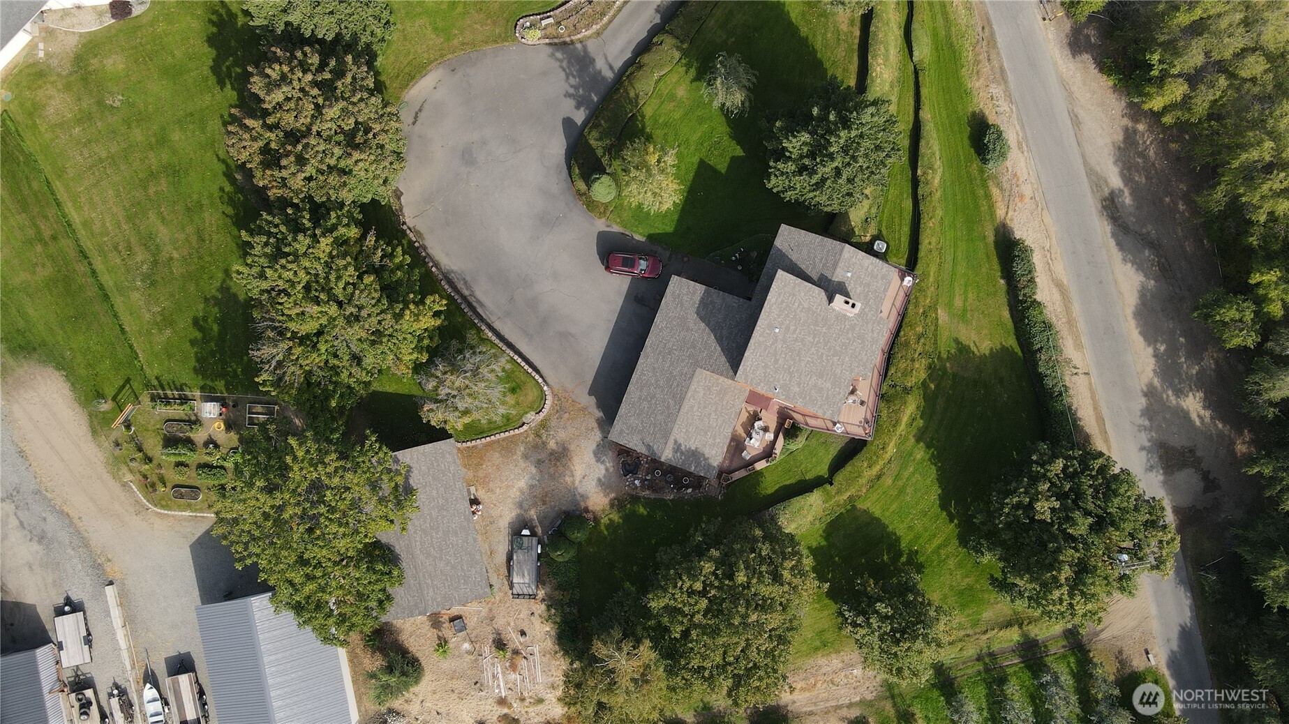 14 Hahn Road Omak, WA 98841 - Photo 35 of 38 an aerial view of a house with a garden