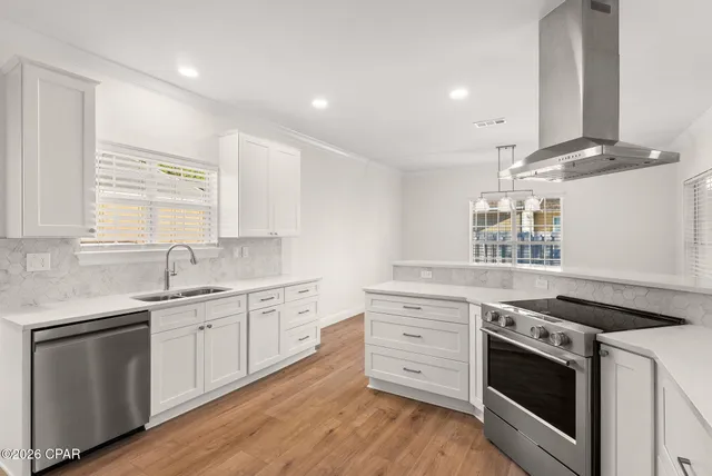 $699,900 | 7009 North Lagoon Drive, Unit 111, Panama City Beach, FL 32408