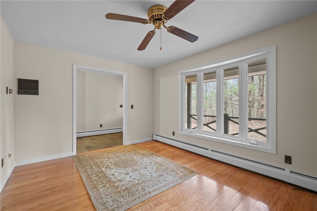30 Sheffield Hill Road Exeter, RI 02822 - Photo 13 of 42 Family room, looking toward entry foyer
