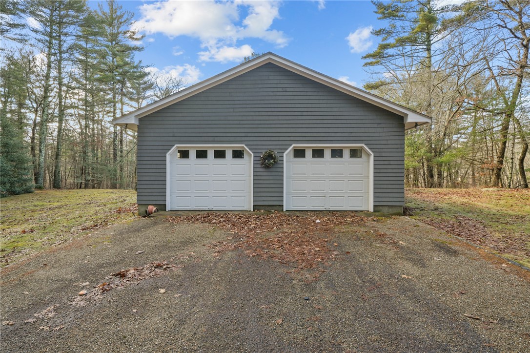 30 Sheffield Hill Road Exeter, RI 02822 - Photo 35 of 42 Oversized two-car garage with storage space