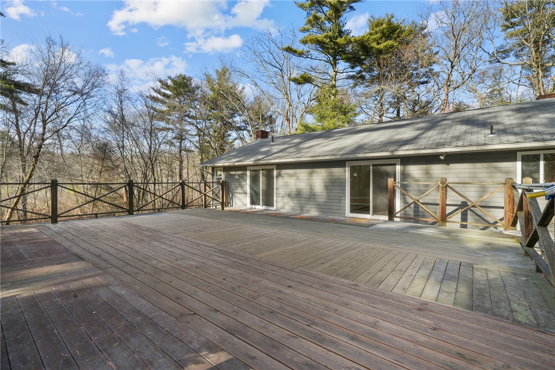 30 Sheffield Hill Road Exeter, RI 02822 - Photo 42 of 42 Please note: there is currently an empty pool in this deck. This photo has been edited to show the potential to rebuild a full deck.