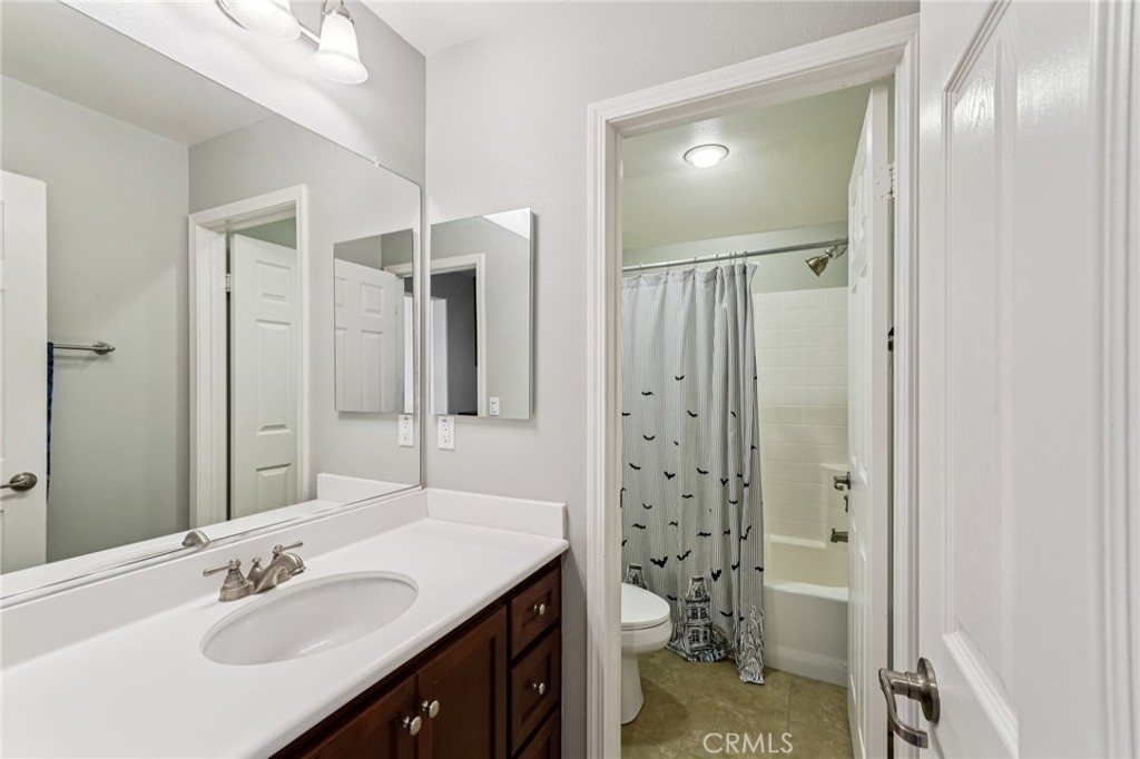 28552 Rustic Glen Street Menifee, CA 92584 - Photo 27 of 48 Versatile upstairs suite with bathroom and extra storage space