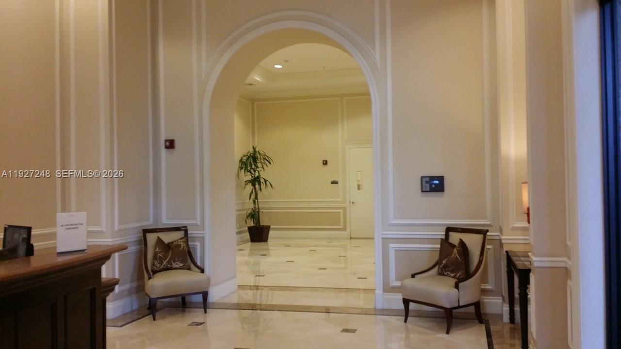 55 Merrick Way, Unit 505 Coral Gables, FL 33134 - Photo 13 of 15 a view of a livingroom with furniture and entryway