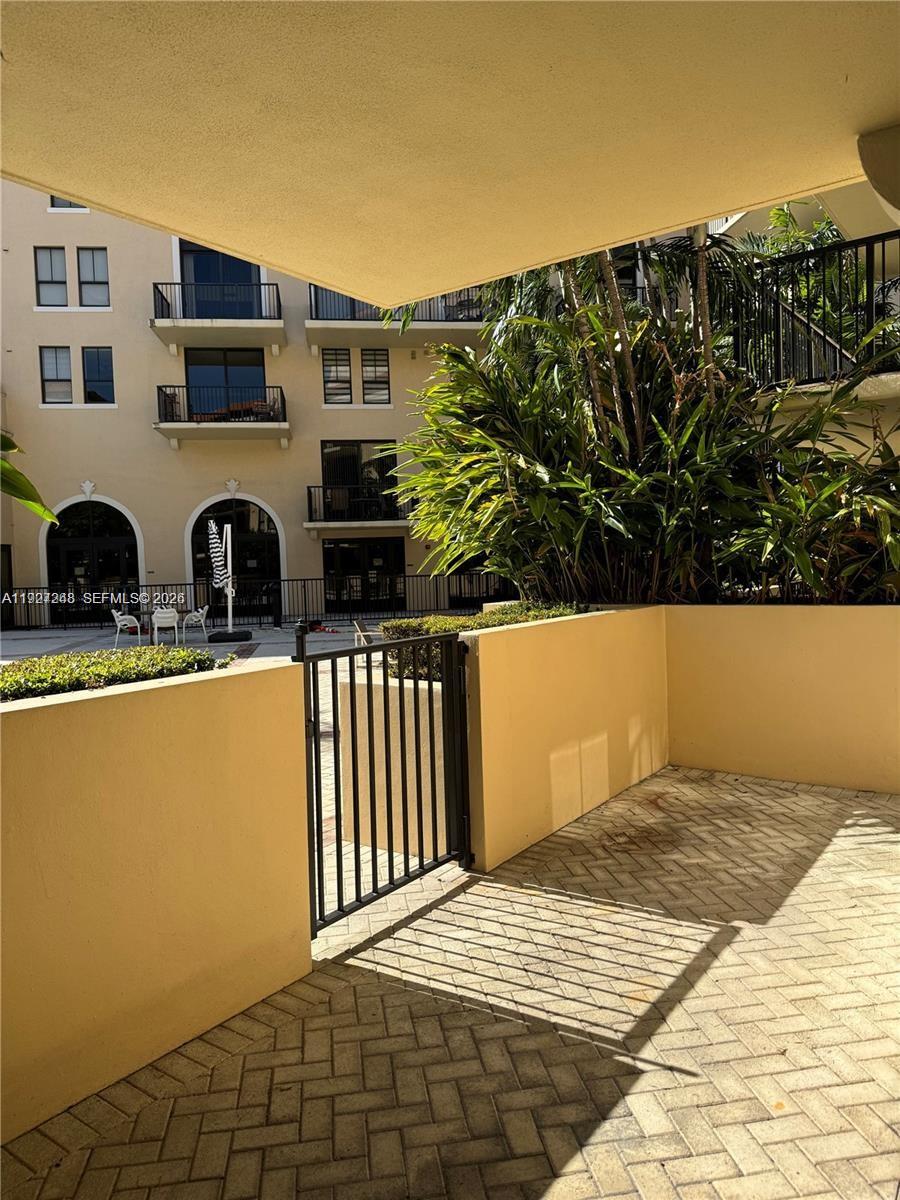 55 Merrick Way, Unit 505 Coral Gables, FL 33134 - Photo 2 of 15 a view of balcony with furniture and city view