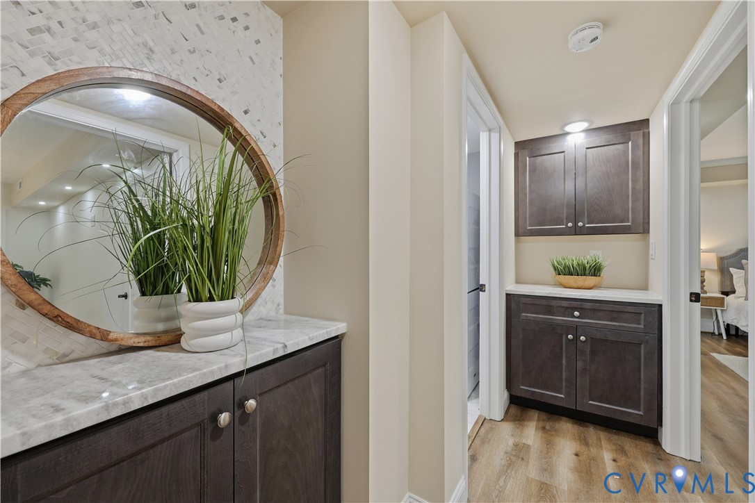 2956 Hathaway Road, Unit 609 Richmond, VA 23225 - Photo 11 of 32 a bathroom with a sink a vanity and a mirror