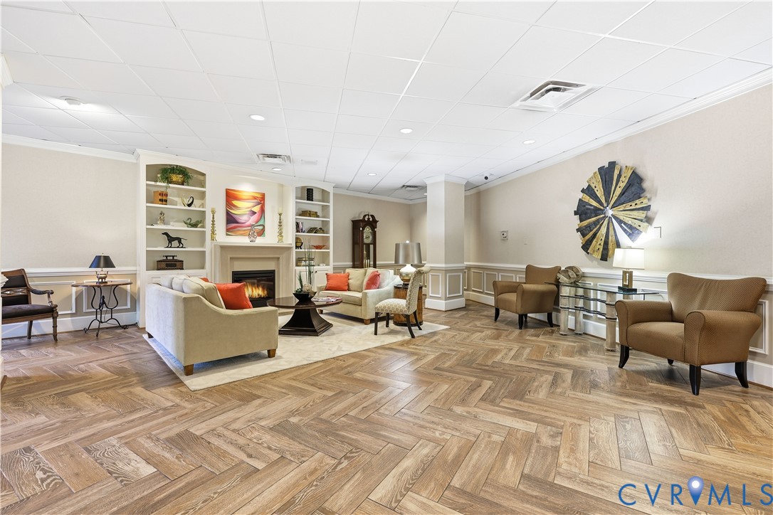 2956 Hathaway Road, Unit 609 Richmond, VA 23225 - Photo 26 of 32 a living room with furniture and a fireplace