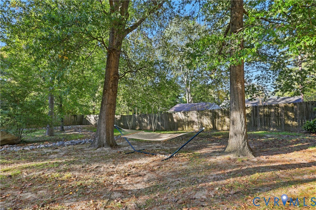 2956 Hathaway Road, Unit 609 Richmond, VA 23225 - Photo 29 of 32 a view of a backyard with large trees