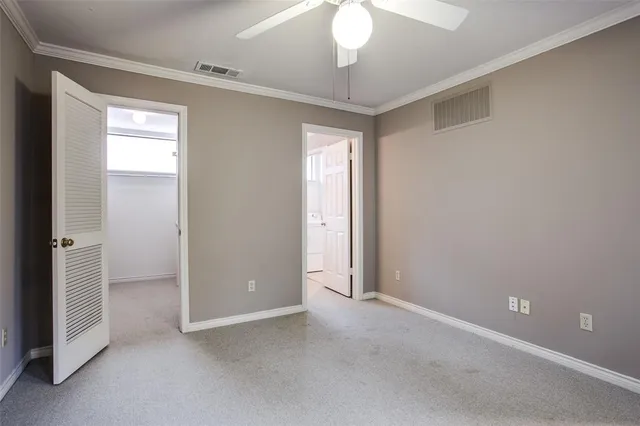 an empty room with a bathroom