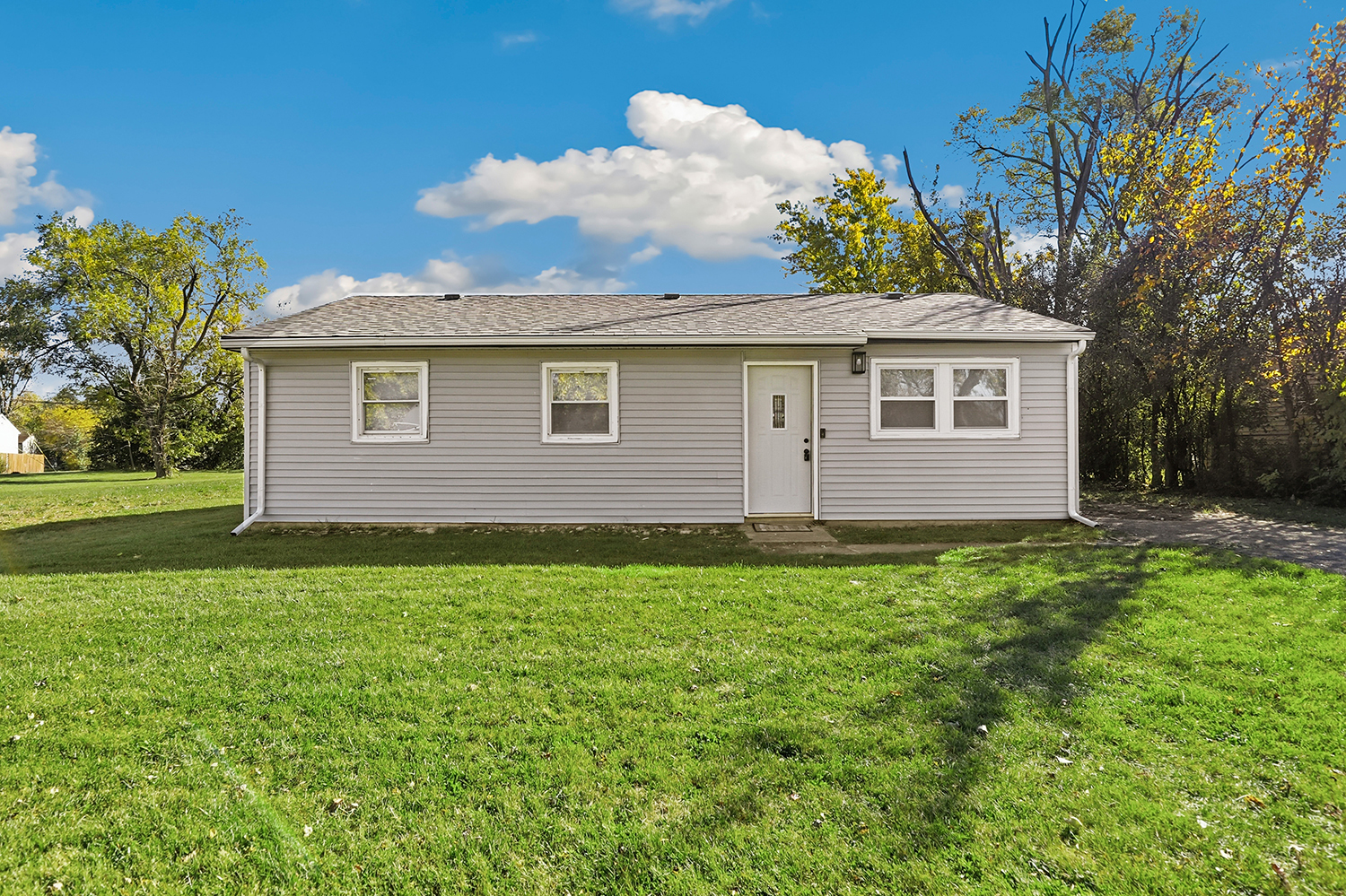 1941 Cambridge Street Chicago Heights, IL 60411 - Photo 1 of 19 a view of a house with a backyard