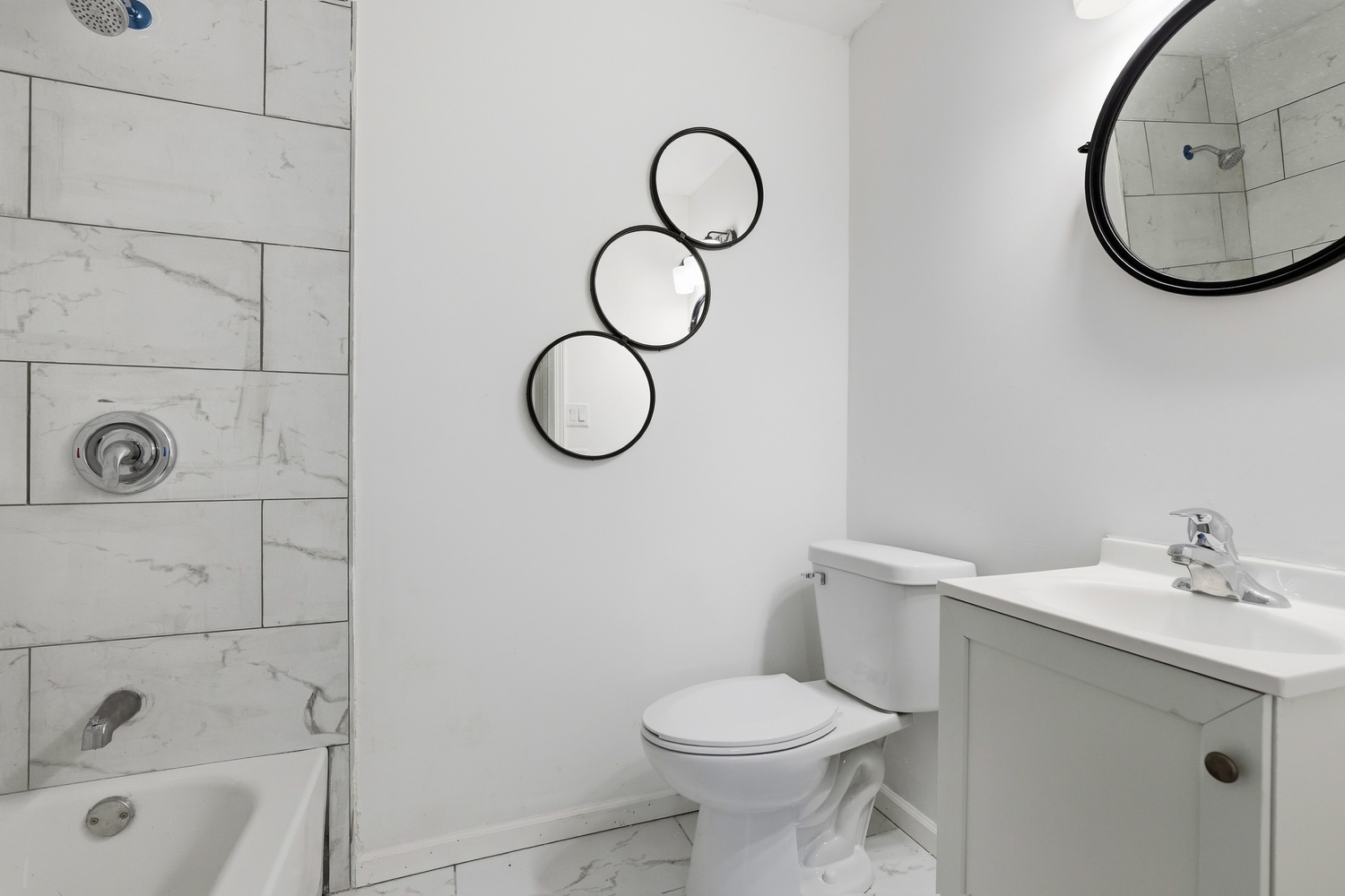 1941 Cambridge Street Chicago Heights, IL 60411 - Photo 14 of 19 a bathroom with a sink mirror and toilet