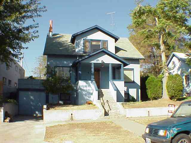 1025 Nevada Street, Unit 3 Reno, NV 89503 - Photo 1 of 1 a front view of a house with a yard