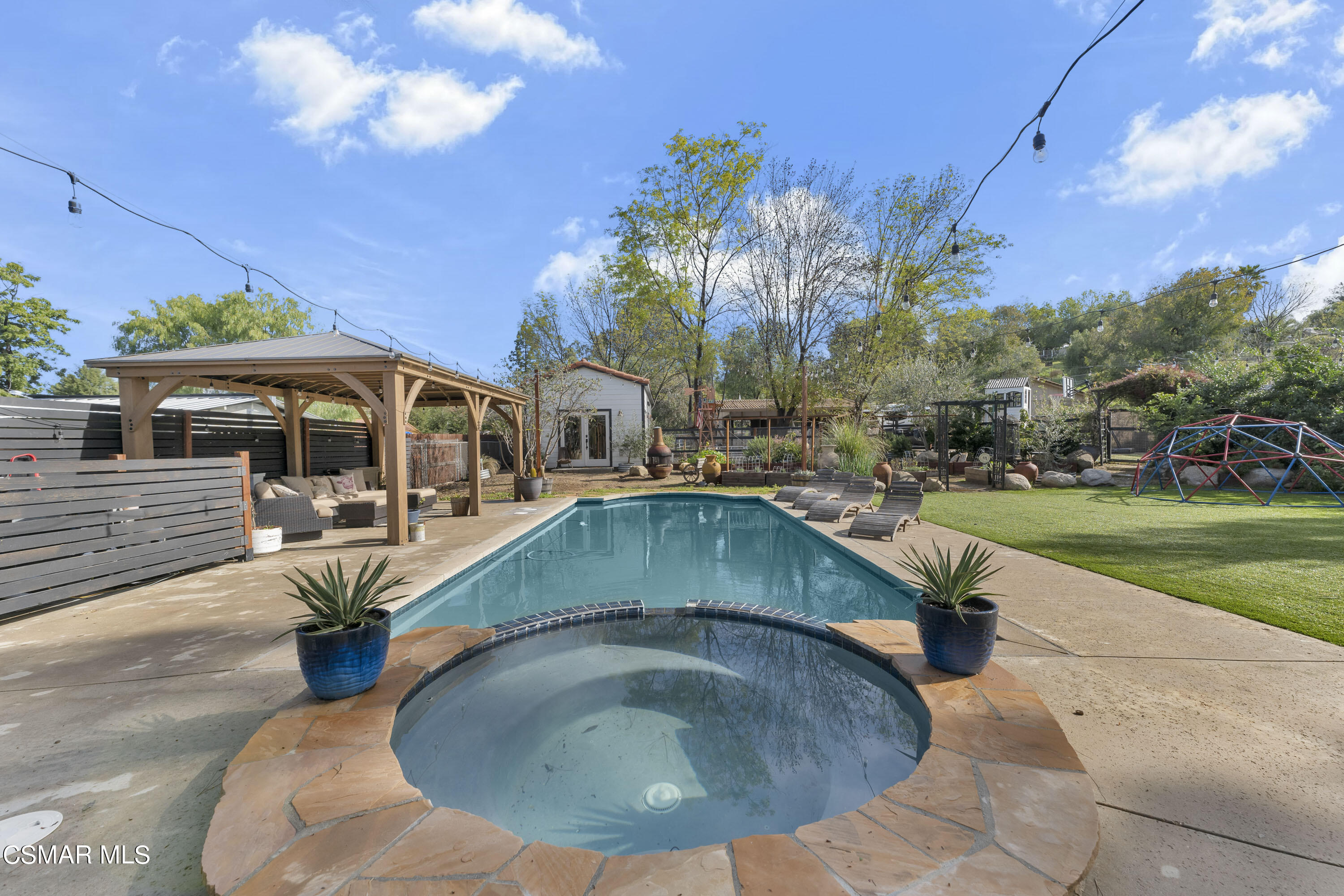 1065 Rambling Road Simi Valley, CA 93065 - Photo 16 of 54 a view of a house with swimming pool
