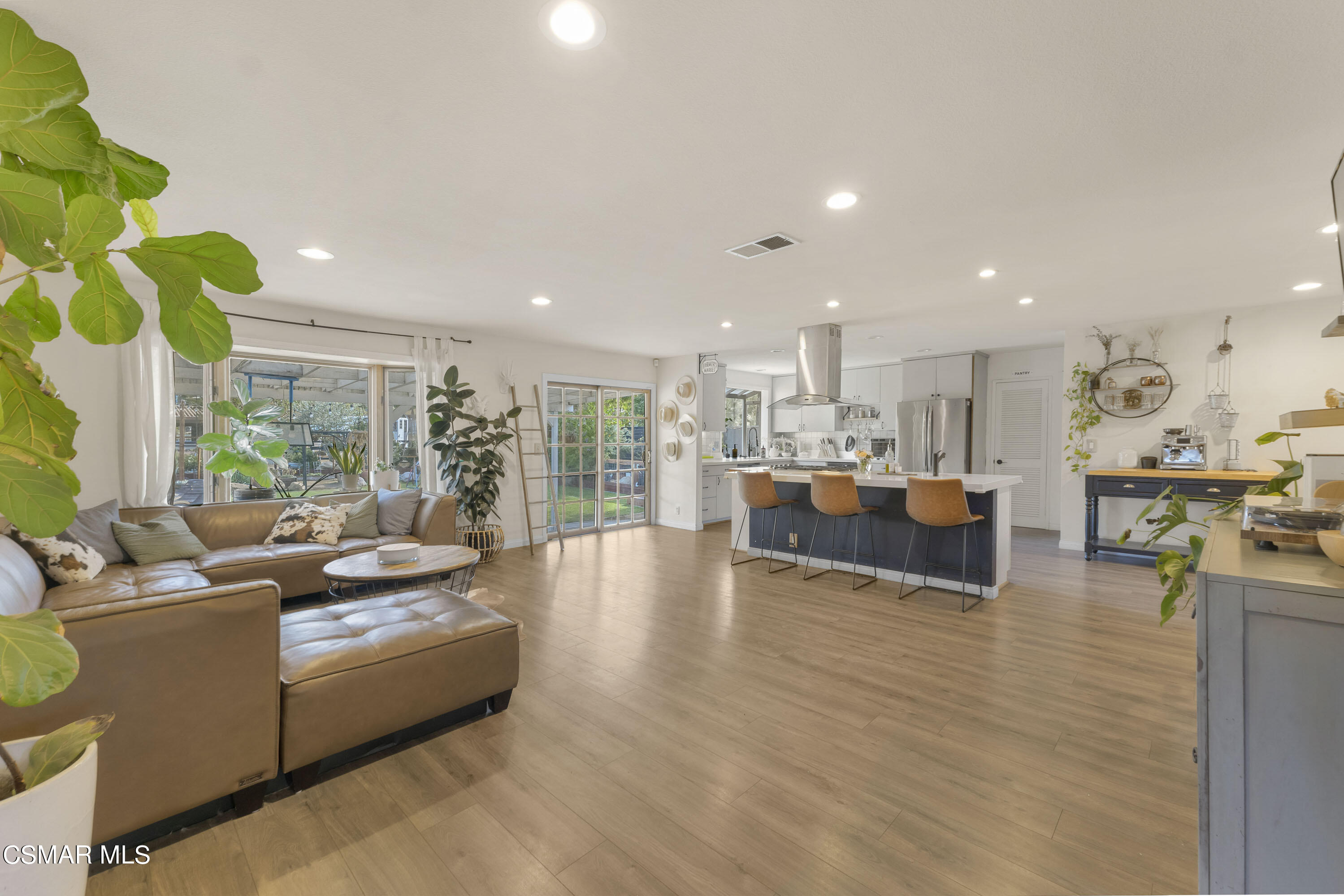 1065 Rambling Road Simi Valley, CA 93065 - Photo 2 of 54 a living room with furniture and a wooden floor