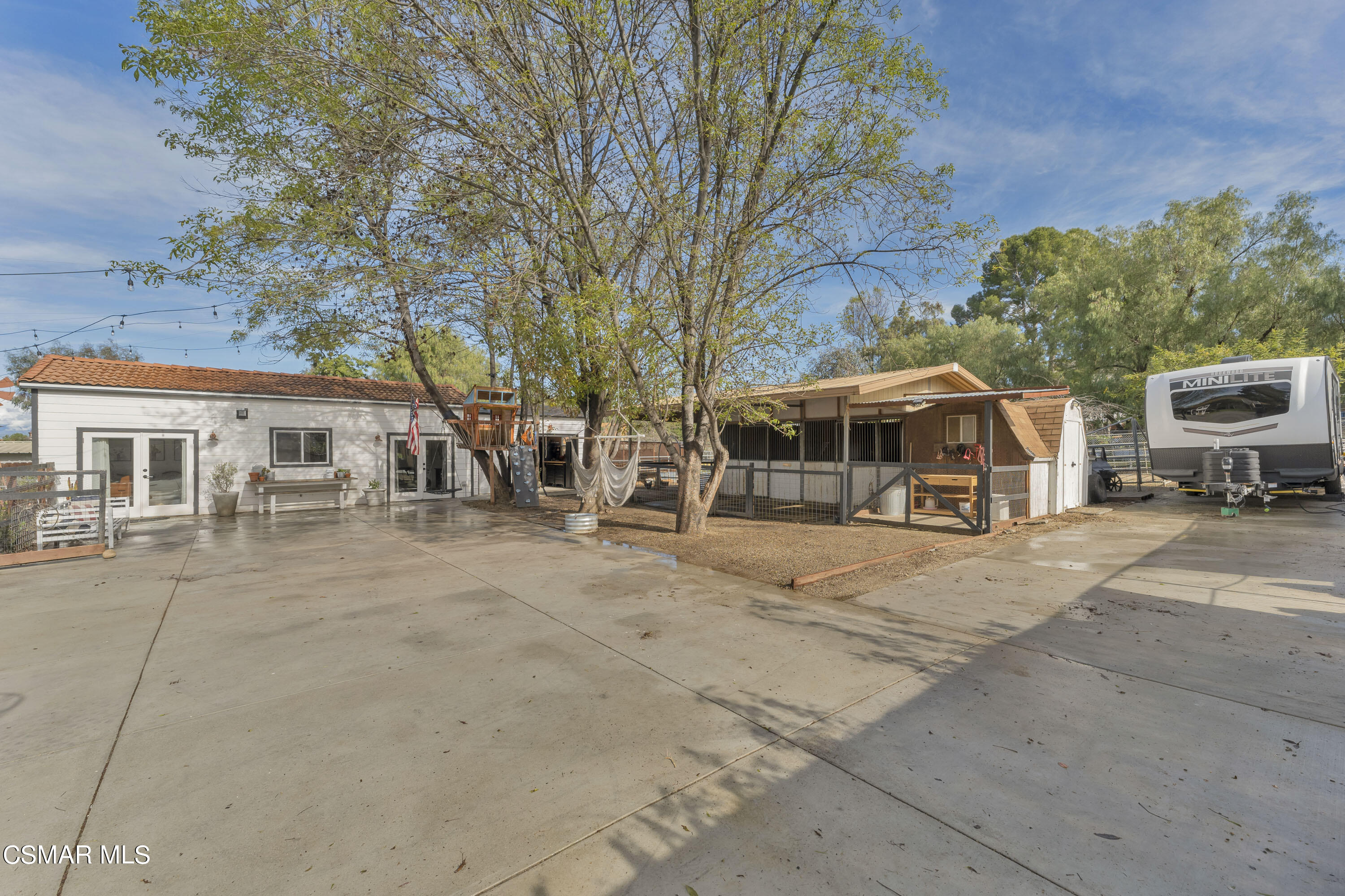 1065 Rambling Road Simi Valley, CA 93065 - Photo 21 of 54 a house with trees in front of it
