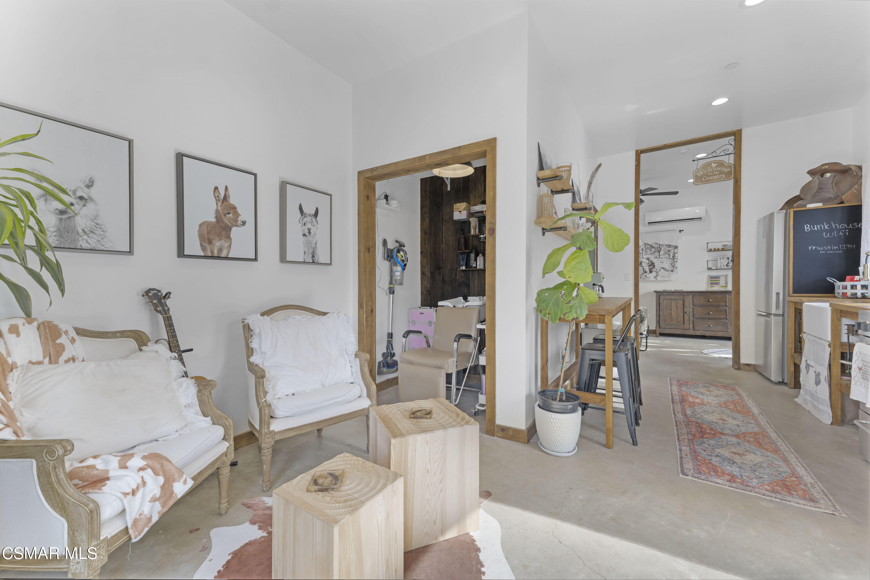 1065 Rambling Road Simi Valley, CA 93065 - Photo 29 of 54 a living room with furniture and flat screen tv