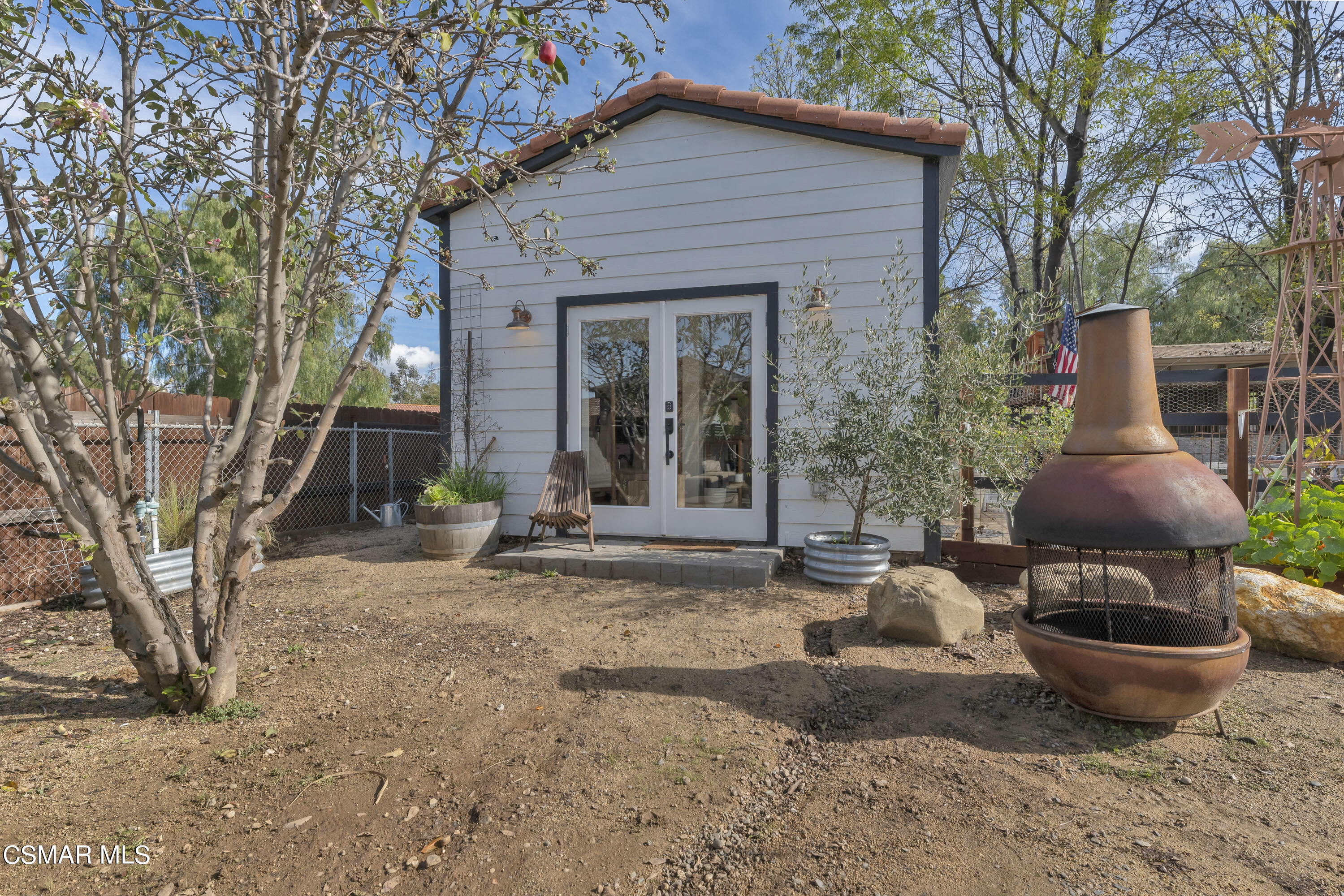 1065 Rambling Road Simi Valley, CA 93065 - Photo 31 of 54 a view of a house with backyard and sitting area