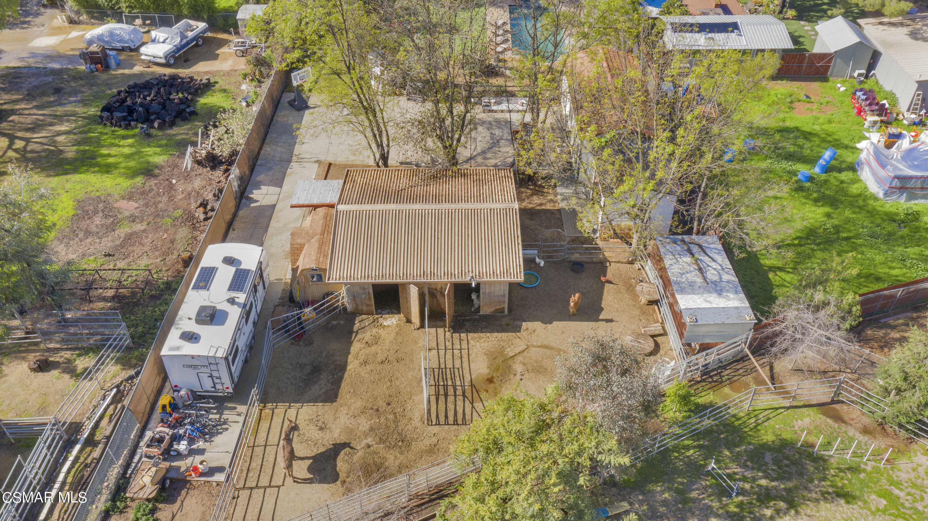 1065 Rambling Road Simi Valley, CA 93065 - Photo 34 of 54 an aerial view of a house with a yard and lake view