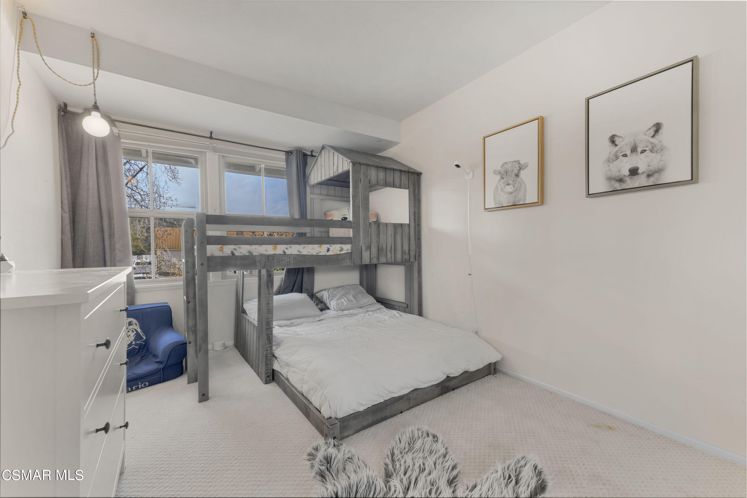 1065 Rambling Road Simi Valley, CA 93065 - Photo 42 of 54 a bedroom with a bed window and wall painting