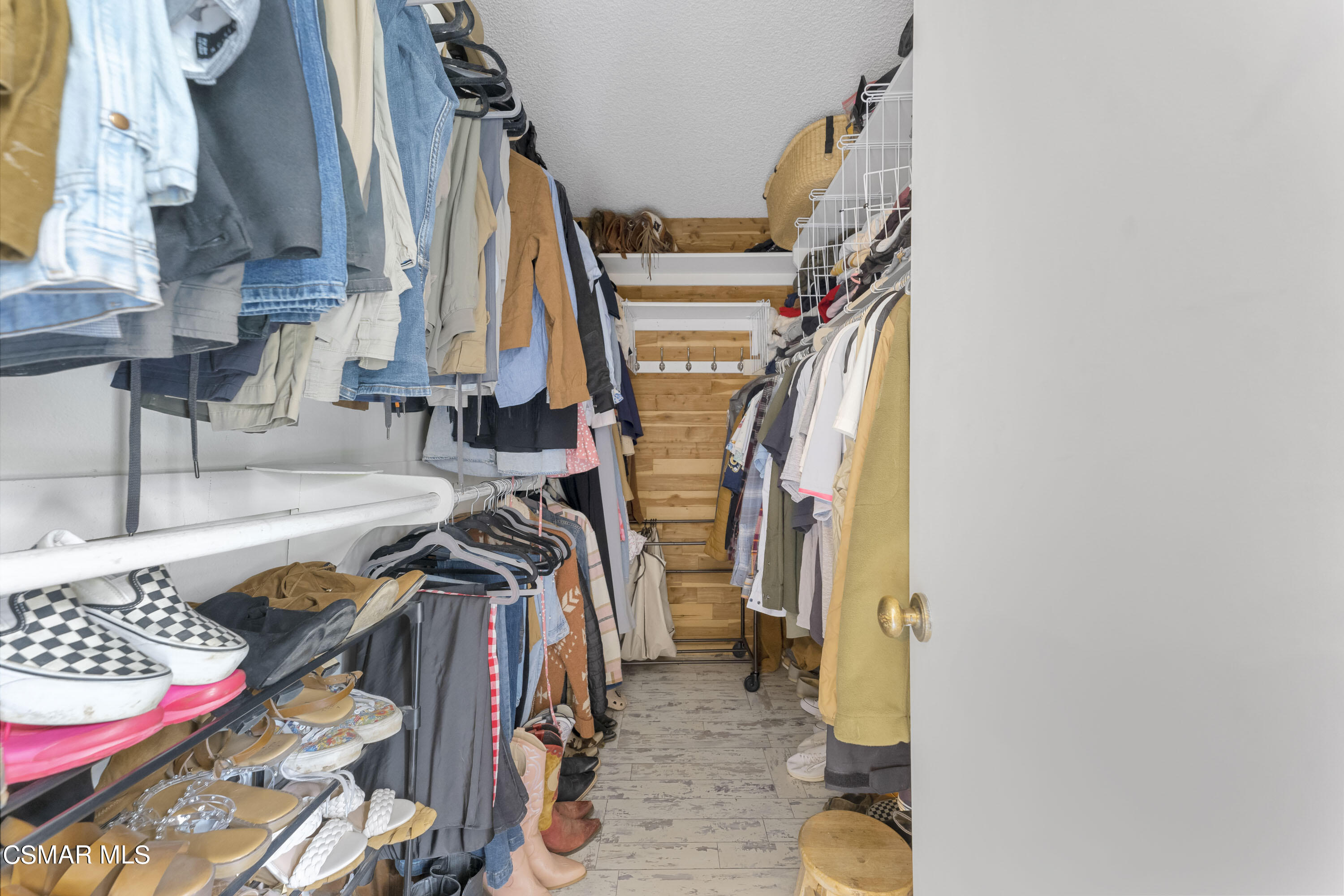 1065 Rambling Road Simi Valley, CA 93065 - Photo 43 of 54 a view of walk in closet with clothes and shoes