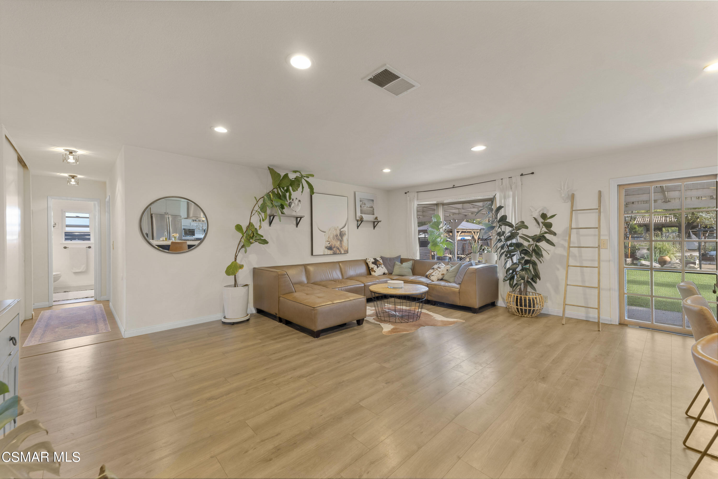 1065 Rambling Road Simi Valley, CA 93065 - Photo 46 of 54 a living room with furniture and a wooden floor
