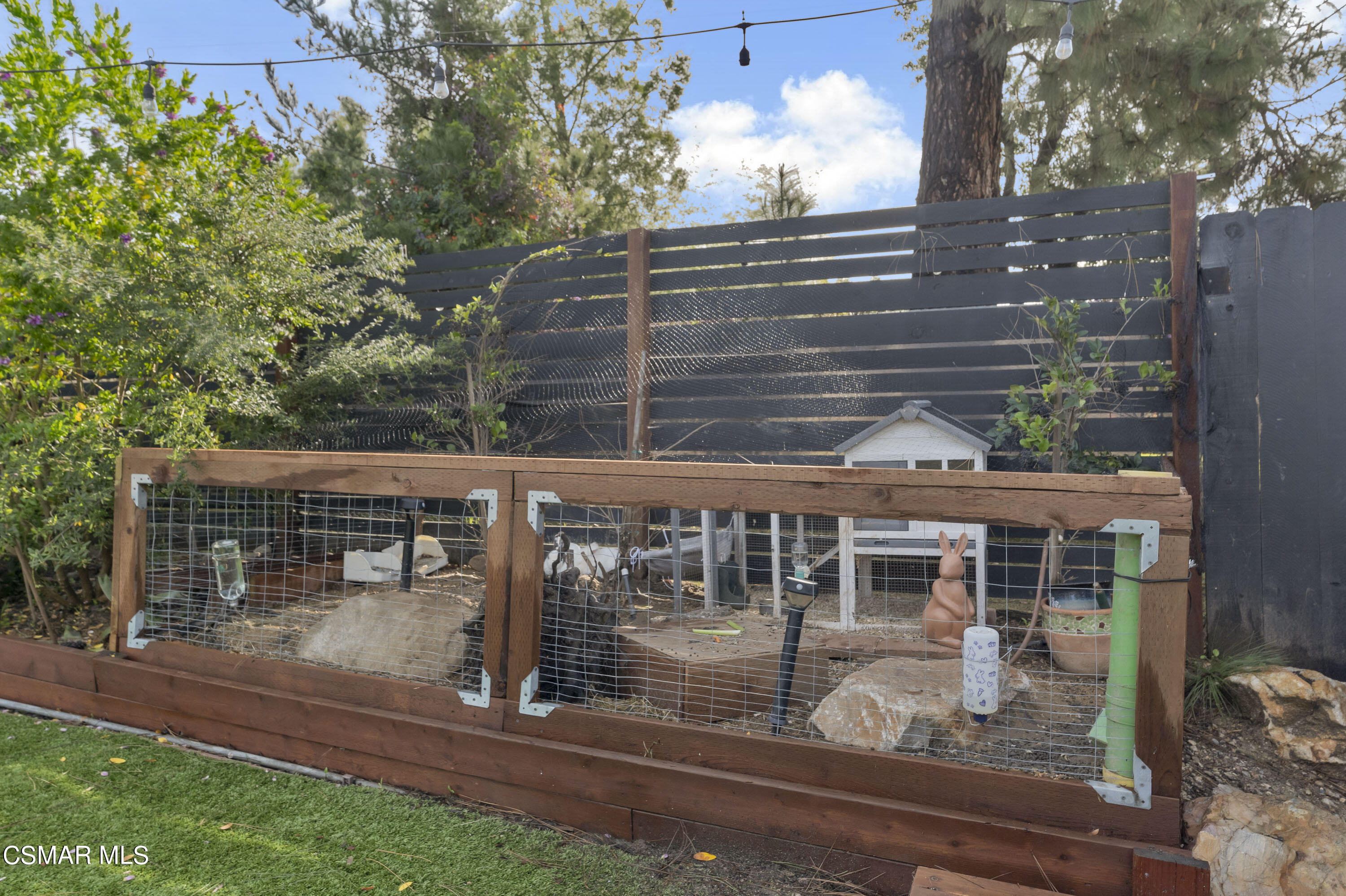 1065 Rambling Road Simi Valley, CA 93065 - Photo 52 of 54 a view of a house with a yard