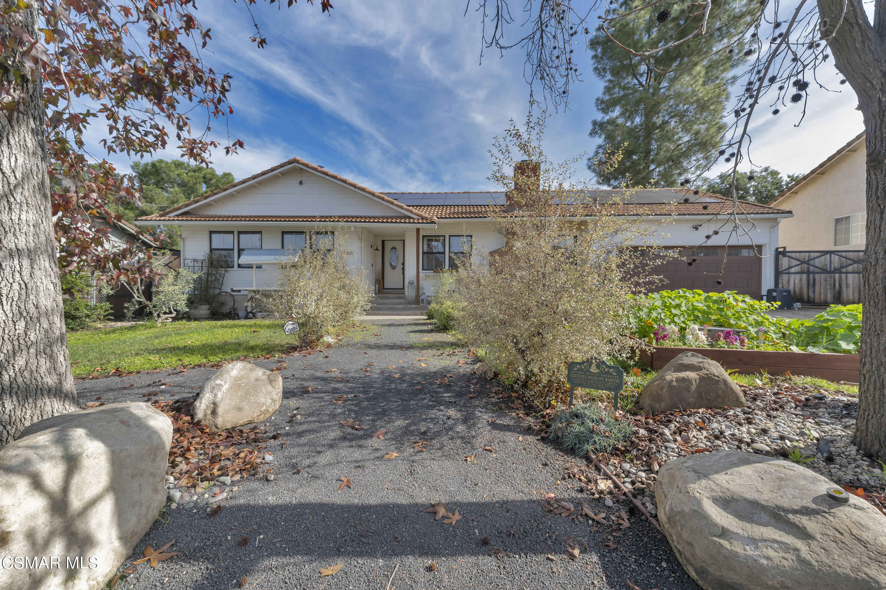 1065 Rambling Road Simi Valley, CA 93065 - Photo 53 of 54 a front view of a house with a yard