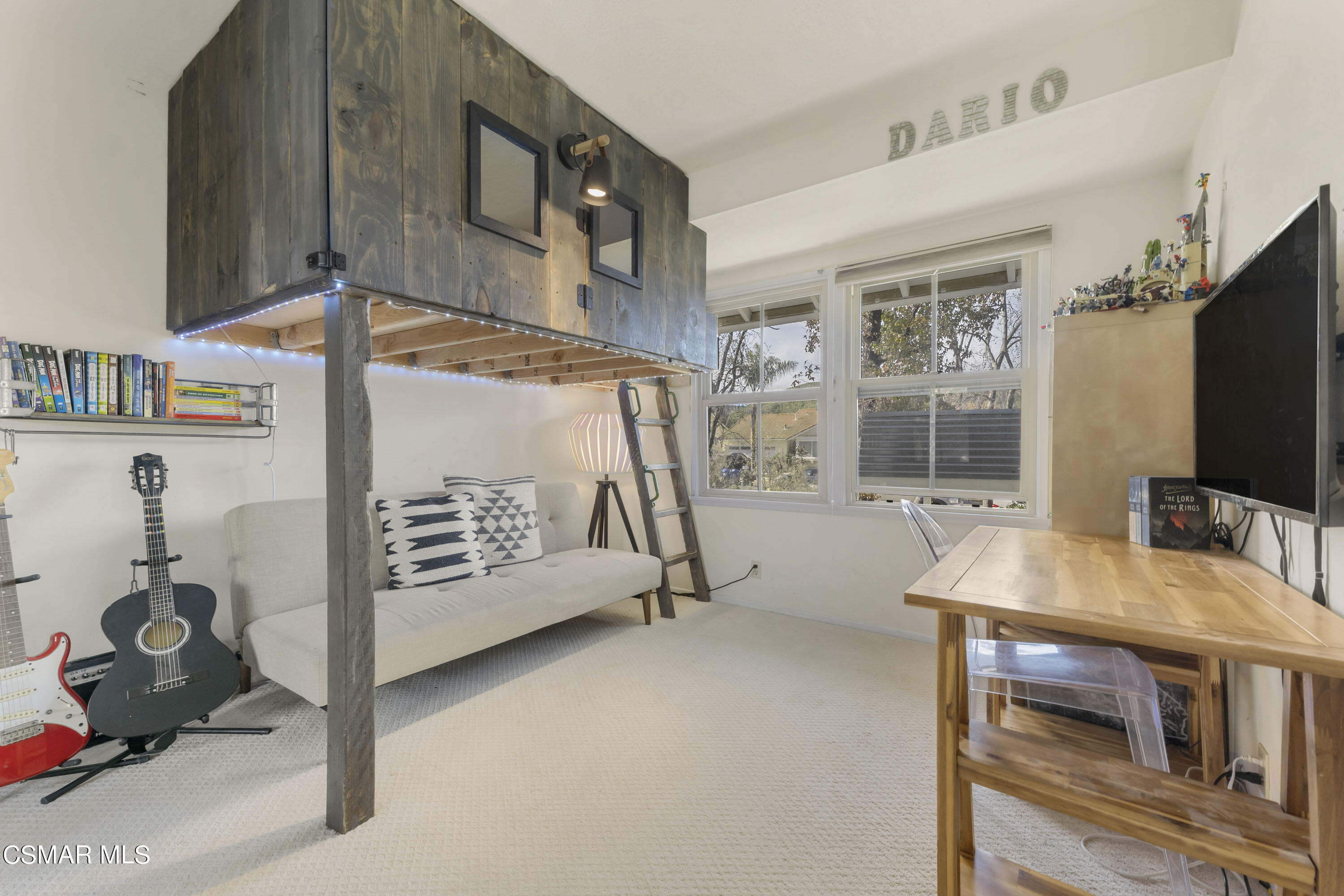 1065 Rambling Road Simi Valley, CA 93065 - Photo 10 of 54 a room with gym equipment and a flat screen tv