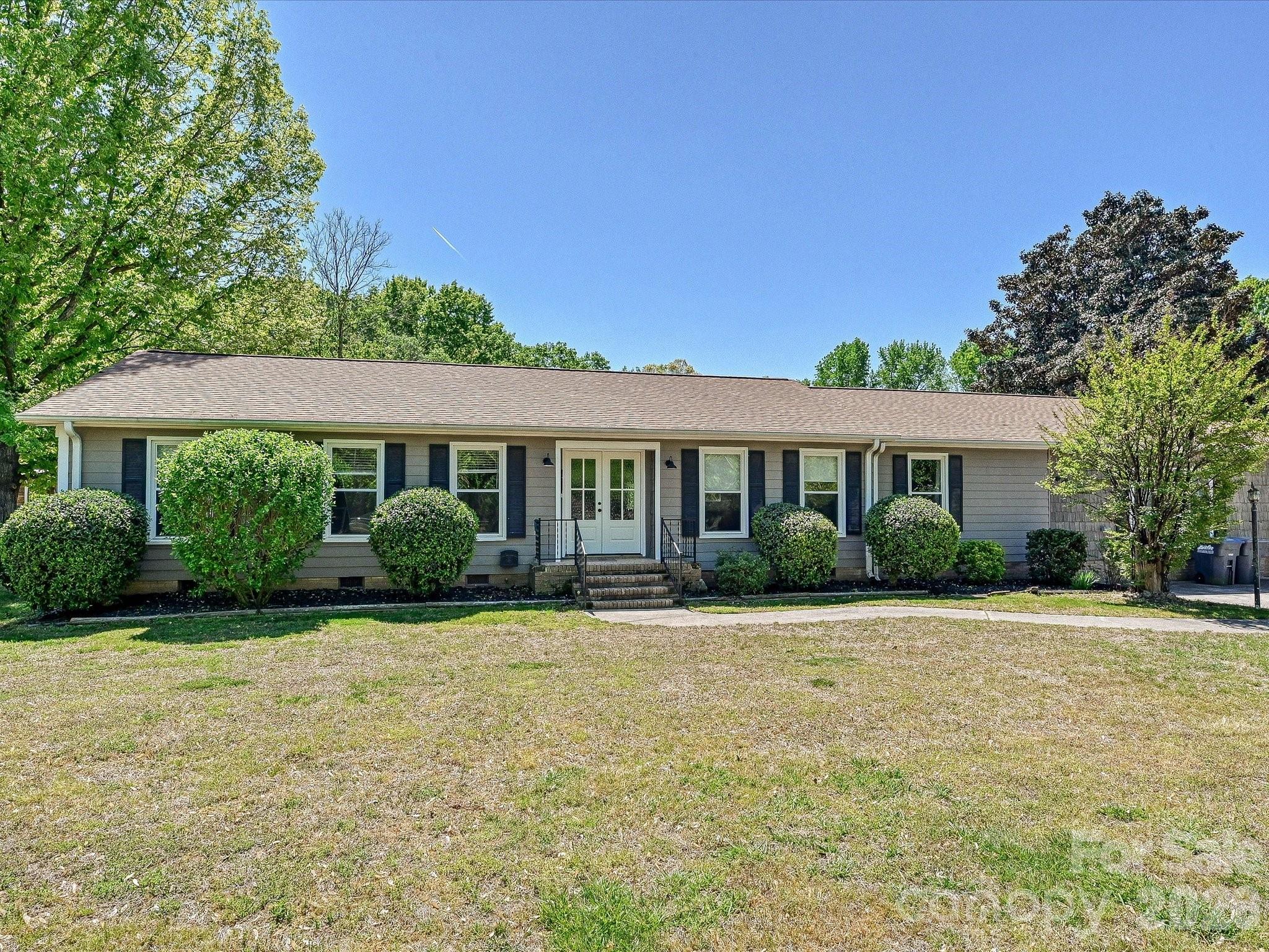 9850 Black Horse Run Road Fort Mill, SC 29707 - Photo 39 of 39 a front view of a house with a yard