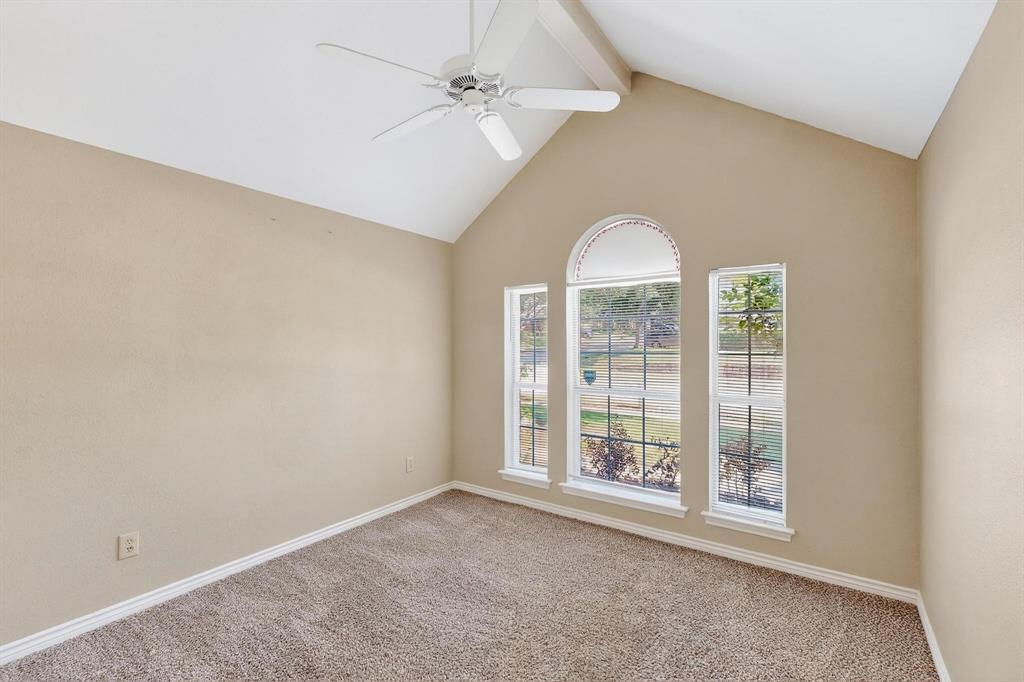 2104 Old McGarrah Road McKinney, TX 75072 - Photo 18 of 39 an empty room with windows and ceiling fan
