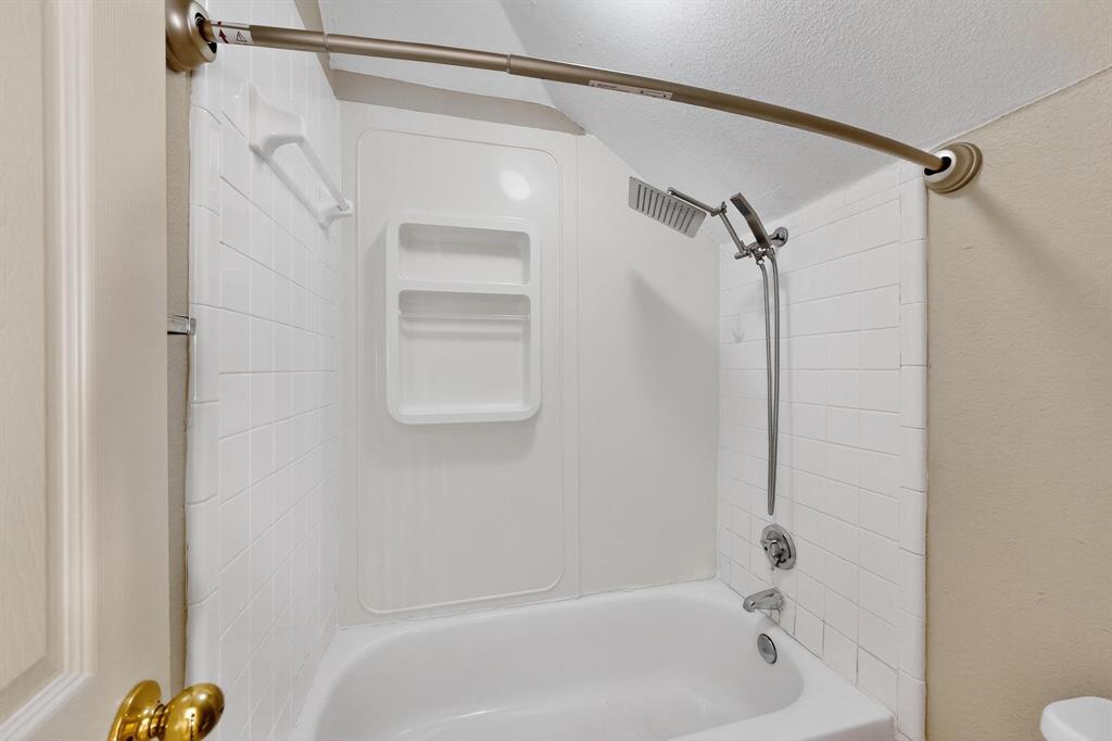 2104 Old McGarrah Road McKinney, TX 75072 - Photo 32 of 39 a bathroom with a shower and a shower