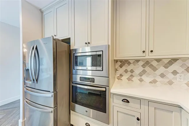 a view of double vanity sink and a mirror