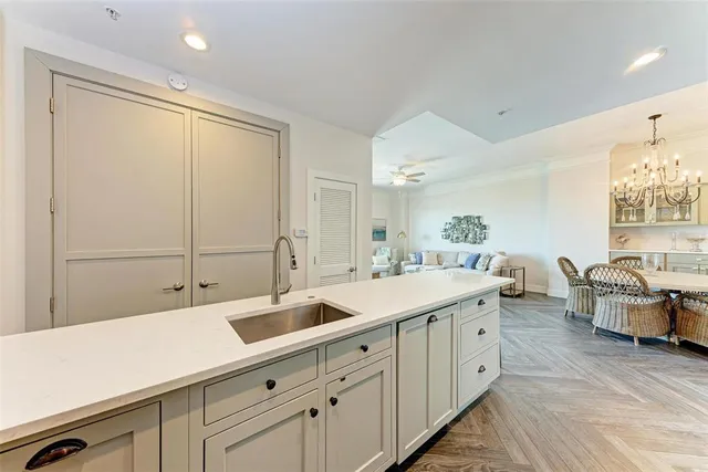 a living room with furniture or wooden floor and a large window