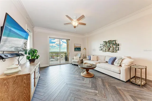 a balcony with chairs and table