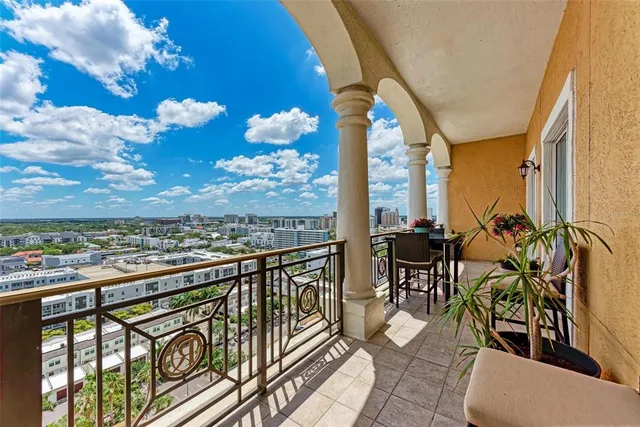 a view of swimming pool with a patio