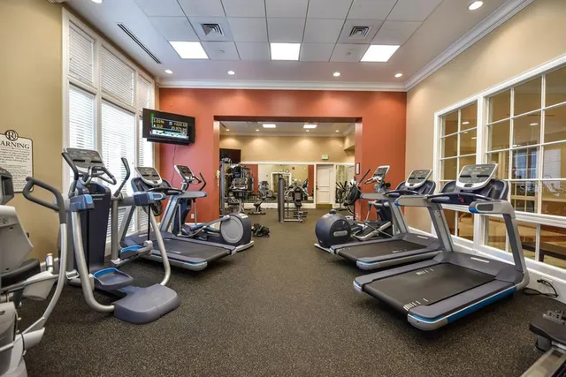 a kitchen with a stove and a window