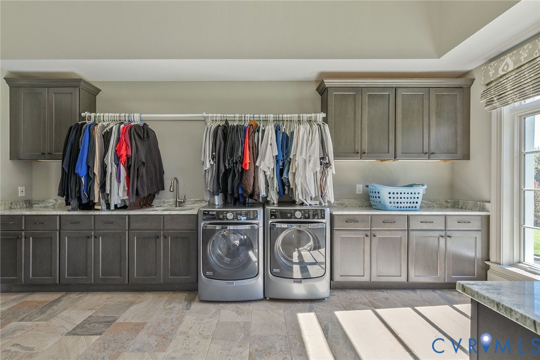 785 Oak Spring Lane Manakin-Sabot, VA 23103 - Photo 34 of 96 First floor laundry room with built-ins, granite c