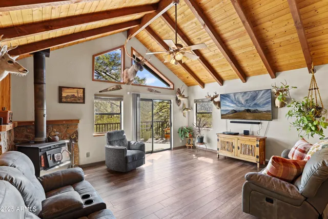 a living room with furniture and a rug