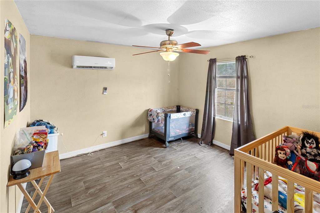 601 Southwest Quarry Circle Fort White, FL 32038 - Photo 16 of 21 a view of a room with toys and wooden floor