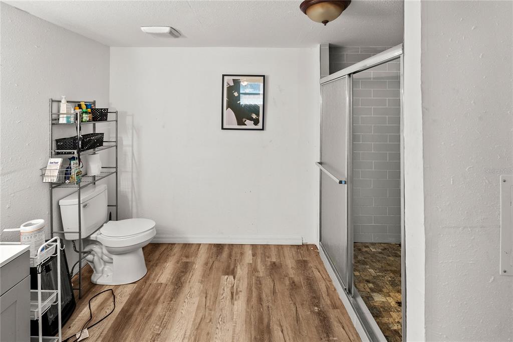 601 Southwest Quarry Circle Fort White, FL 32038 - Photo 8 of 21 a bathroom with a toilet and a shower