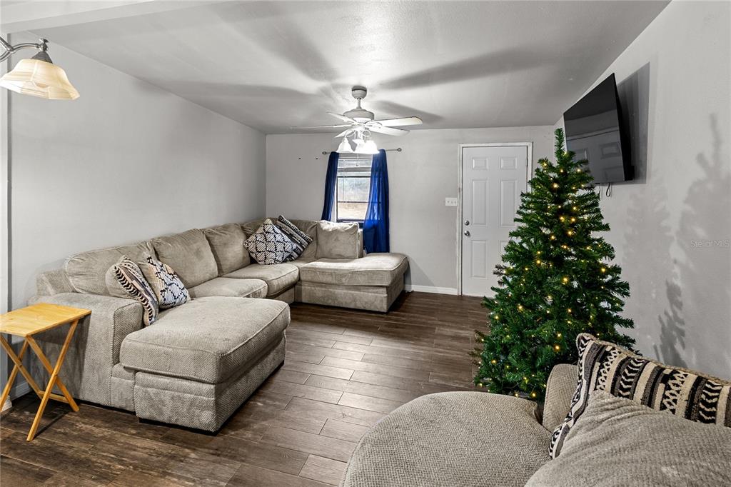 601 Southwest Quarry Circle Fort White, FL 32038 - Photo 10 of 21 a living room with furniture and a christmas tree
