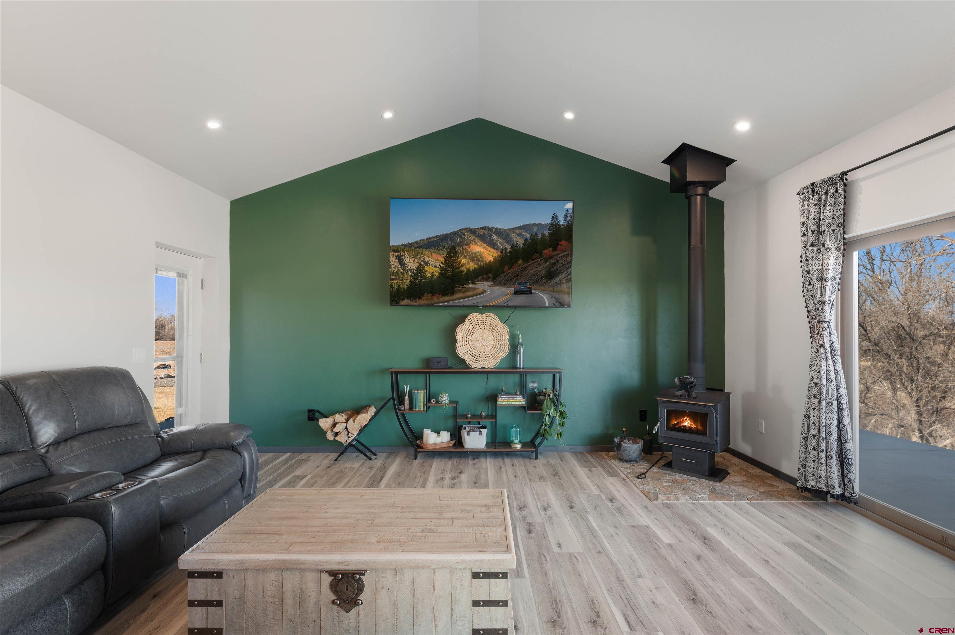 55347 Begonia Road Delta, CO 81416 - Photo 34 of 44 a living room with furniture and a wooden floor