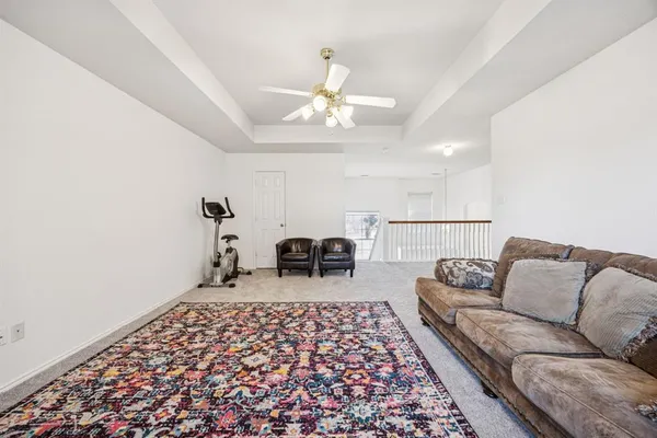 a living room with furniture and a couch