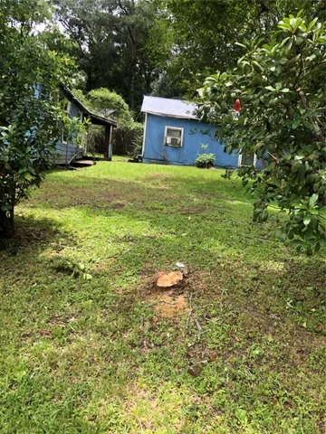 a view of an outdoor space and a yard
