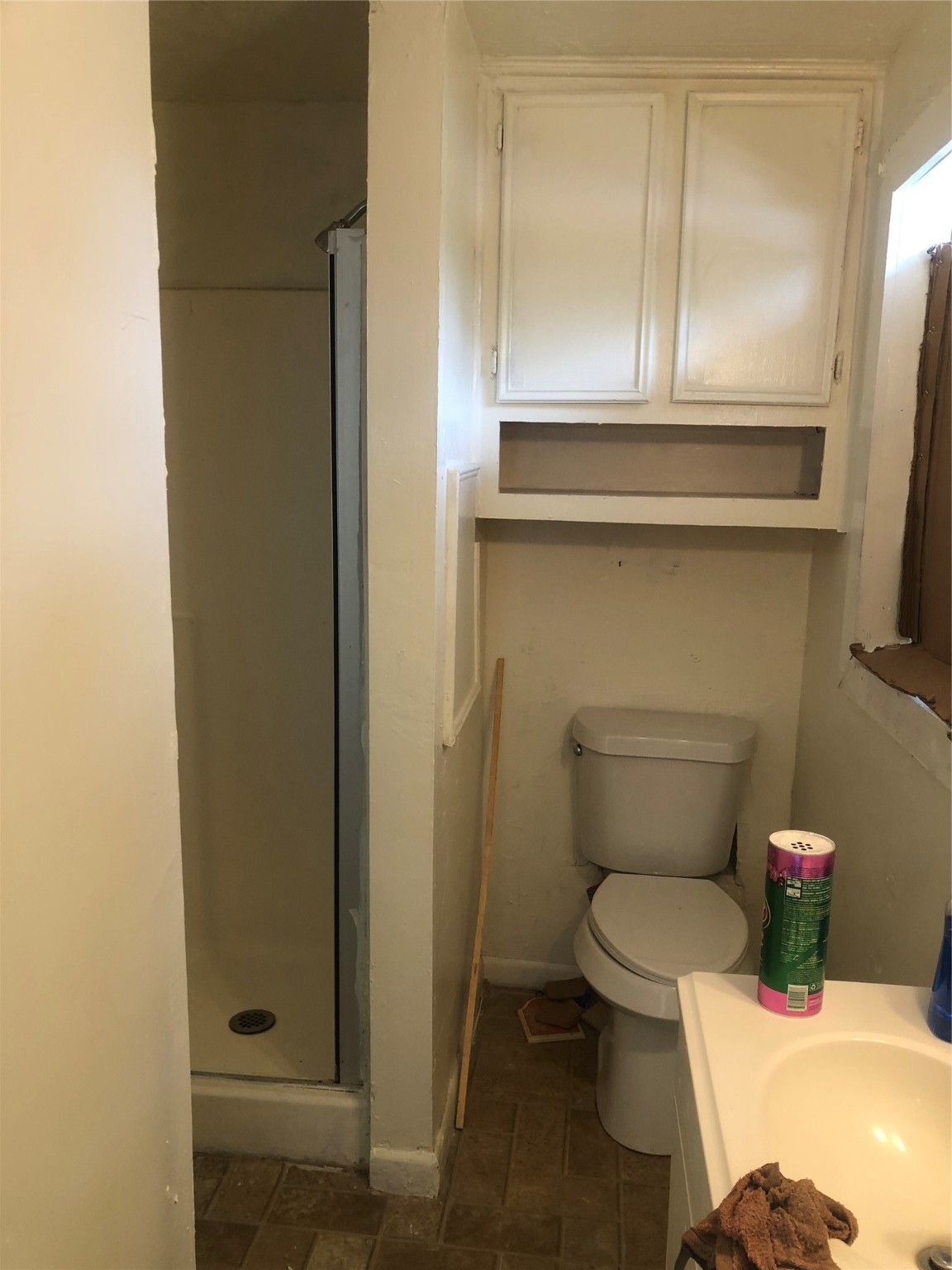 409 7th Street Huntsville, TX 77320 - Photo 6 of 17 a bathroom with a toilet and a sink