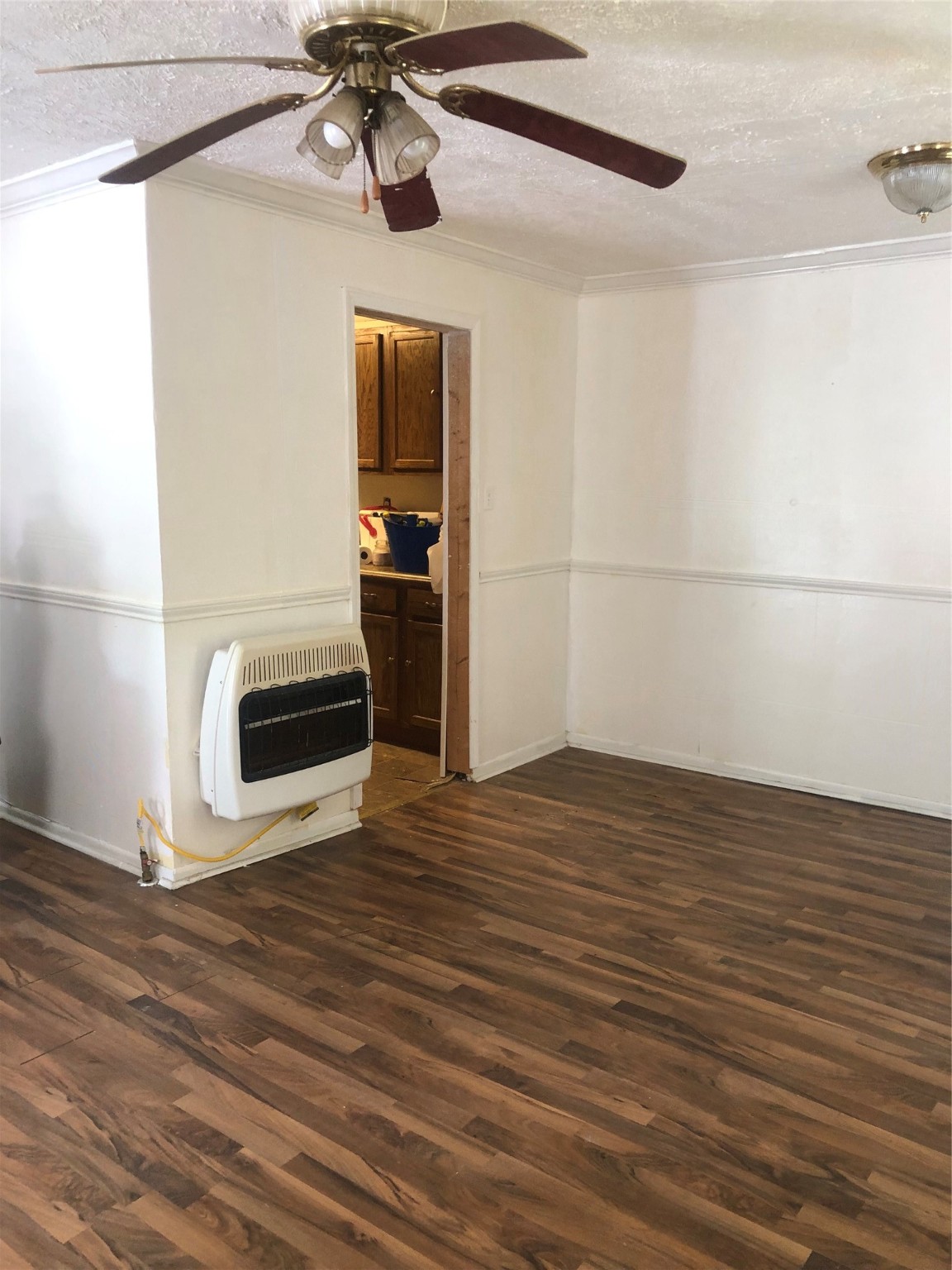 409 7th Street Huntsville, TX 77320 - Photo 9 of 17 a view of a livingroom with wooden floor