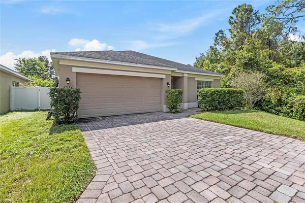 a house with yard and a space