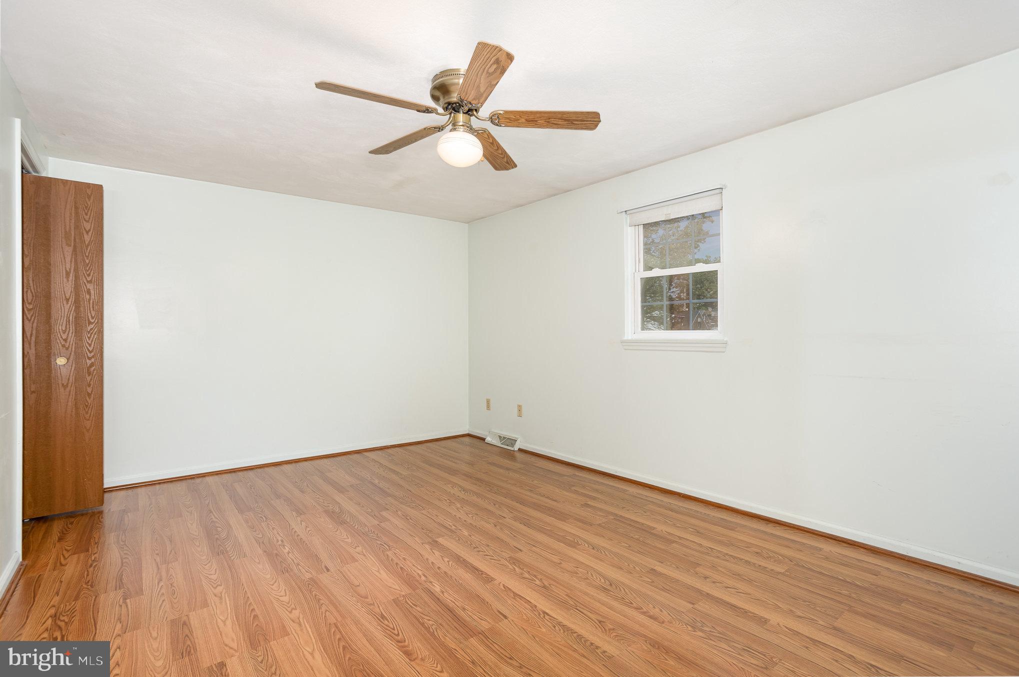 415 Weldon Drive York, PA 17404 - Photo 12 of 34 a view of a big room with wooden floor and closet area
