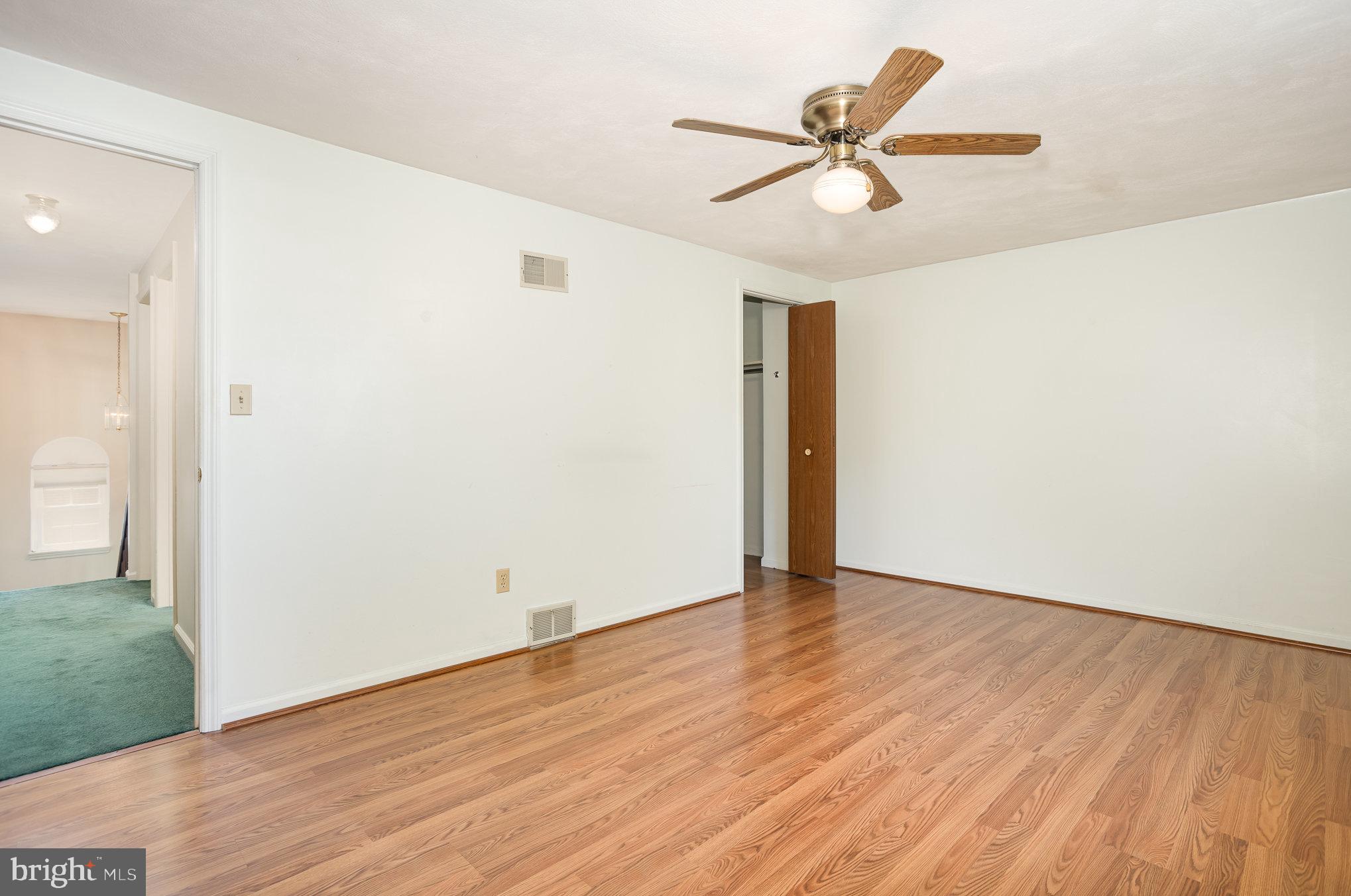 415 Weldon Drive York, PA 17404 - Photo 13 of 34 a view of room with wooden floor and a ceiling fan