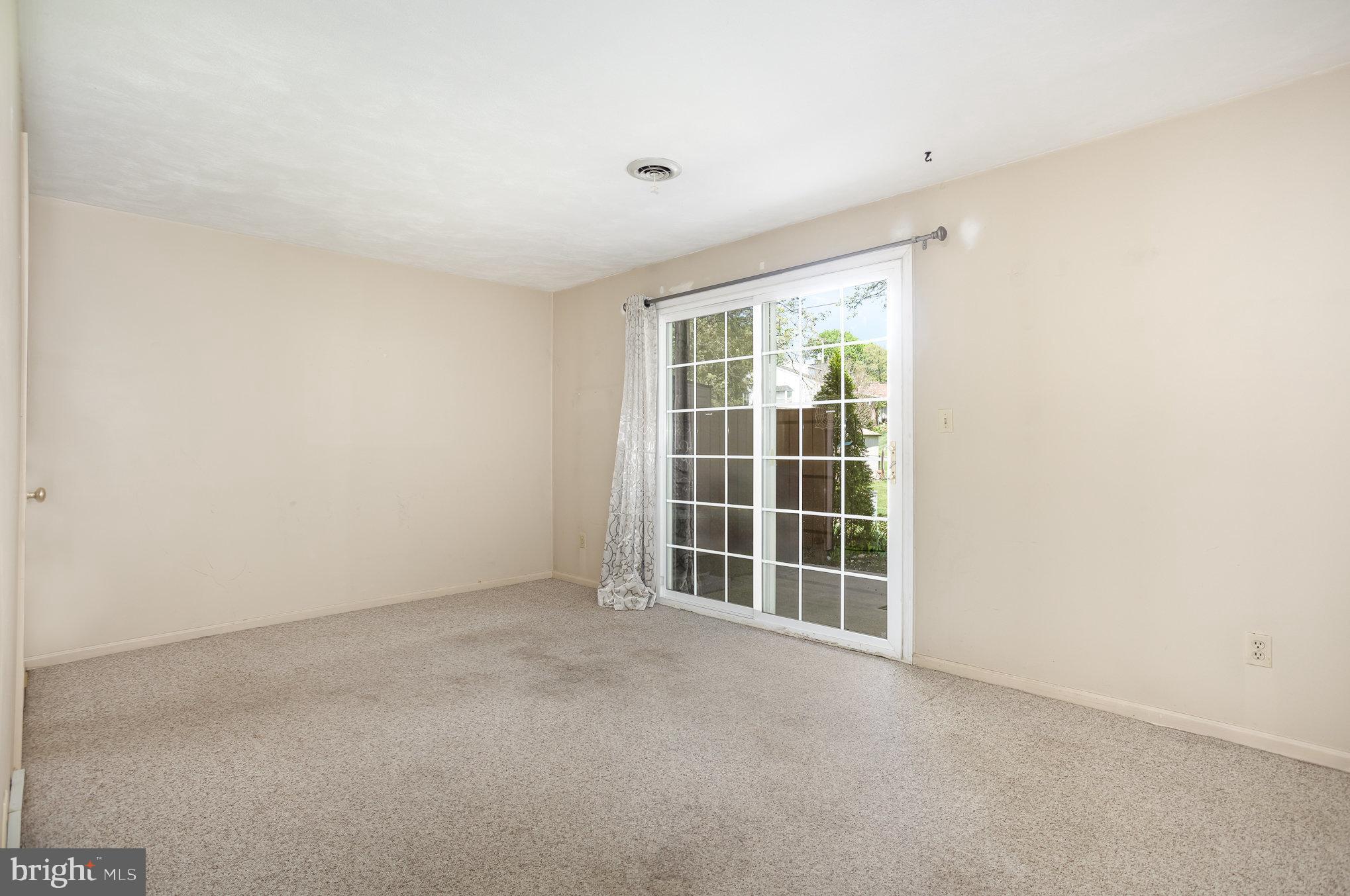 415 Weldon Drive York, PA 17404 - Photo 19 of 34 a view of an empty room with a window